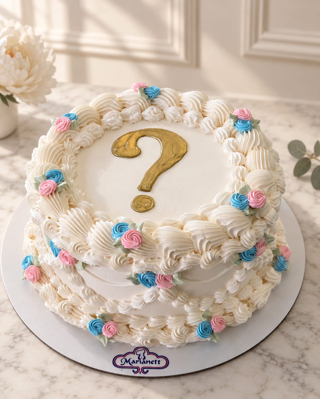 Pastel de revelación de género con signo de interrogación